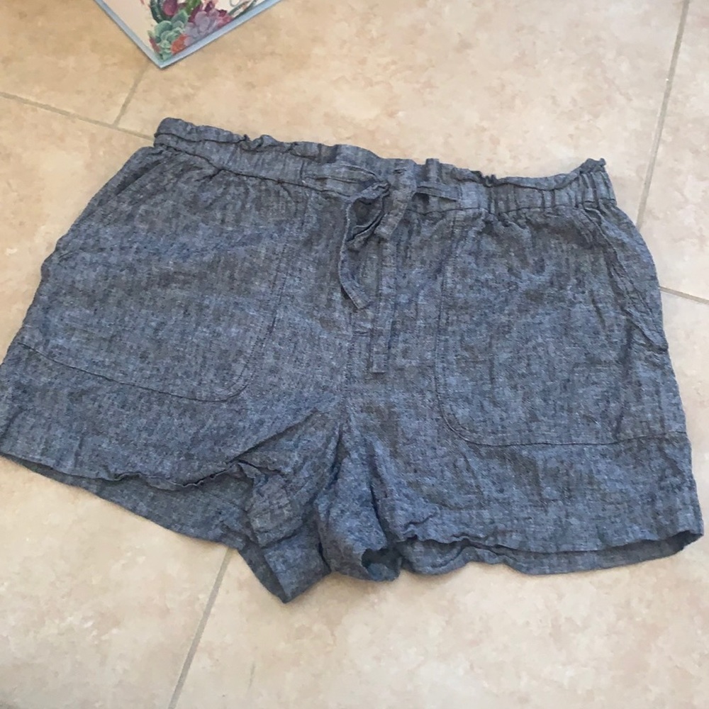 Women’s denim color paper bag high waist shorts.
